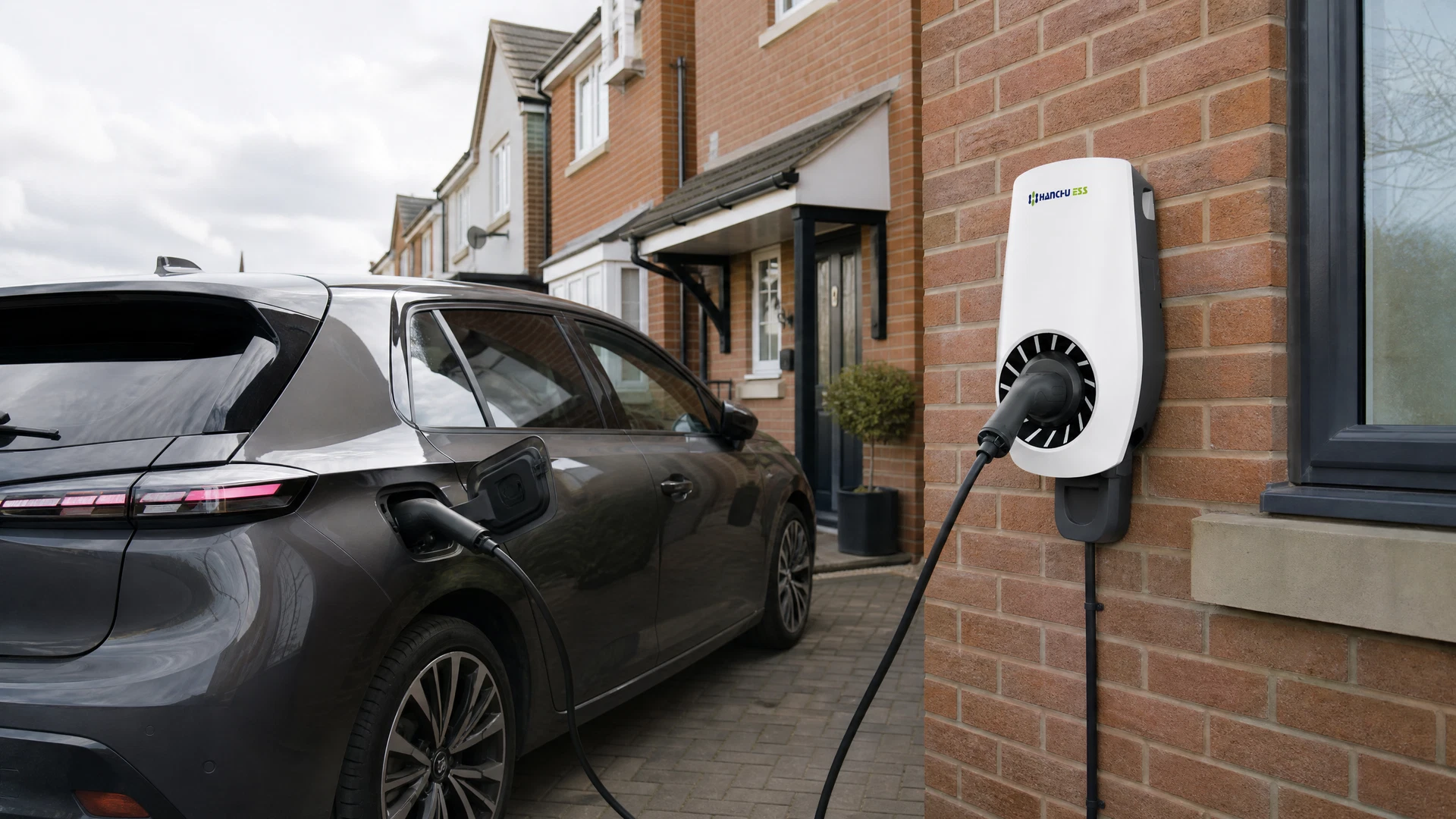 Hanchu ESS EV charger installed at a UK semi-detached home driveway by Home Energy Group